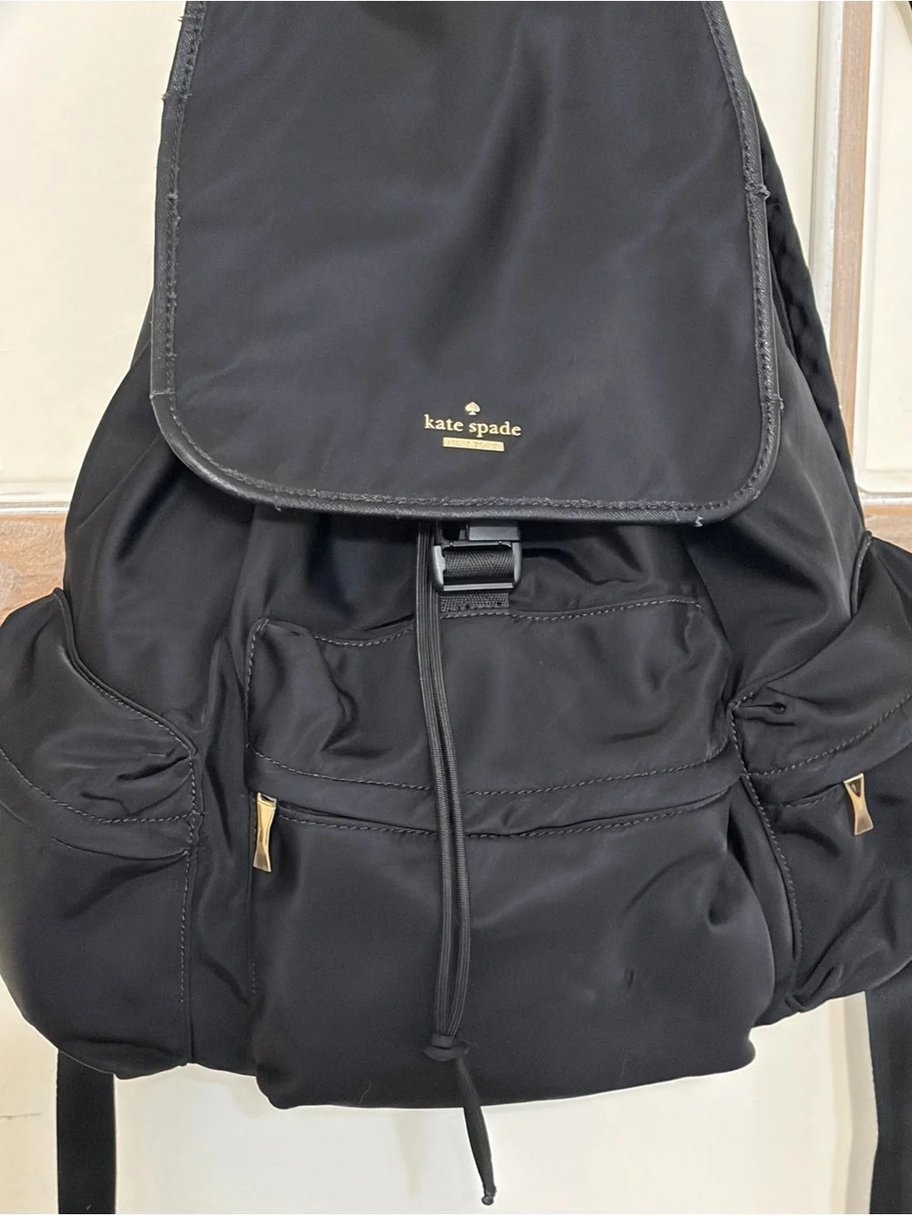 kate spade Black Nylon Drawstring Backpack with Gold Accents